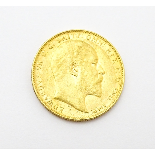 966 - Coin: An Edward VII 1905 gold sovereign coin. Approx. 8g