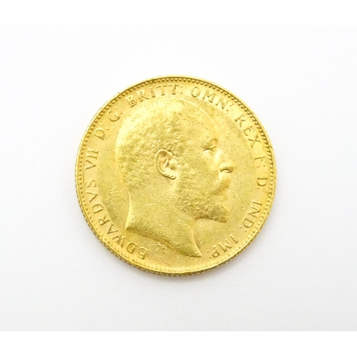 966 - Coin: An Edward VII 1905 gold sovereign coin. Approx. 8g