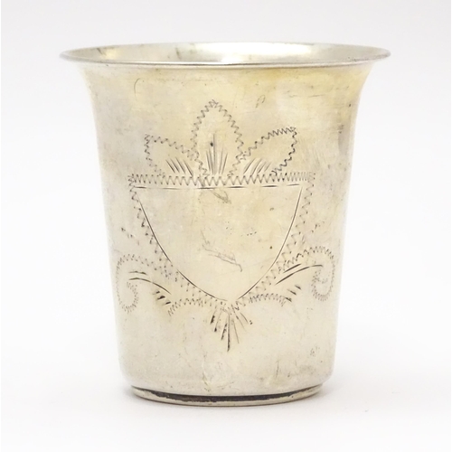 535 - A .800 silver beaker with engraved decoration. Possibly Israeli. Approx. 2 1/2