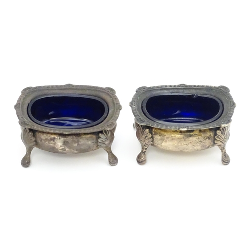 540A - A pair of silver salts with blue glass liners Birmingham 1944, maker Edward Barnard & Sons Ltd. Toge... 