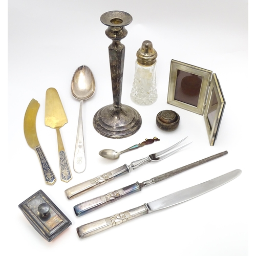 663 - Assorted silver, white metal and silver plated wares to include candlestick, blotter, carving set,  ... 