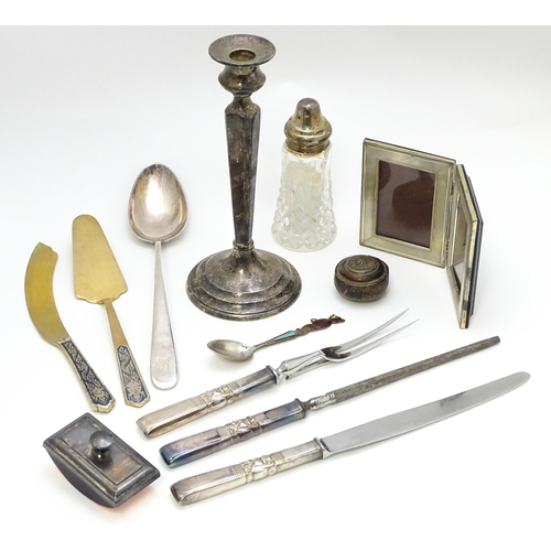 663 - Assorted silver, white metal and silver plated wares to include candlestick, blotter, carving set,  ... 