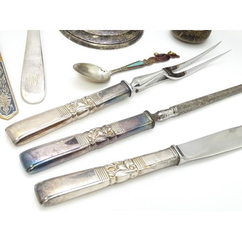 663 - Assorted silver, white metal and silver plated wares to include candlestick, blotter, carving set,  ... 