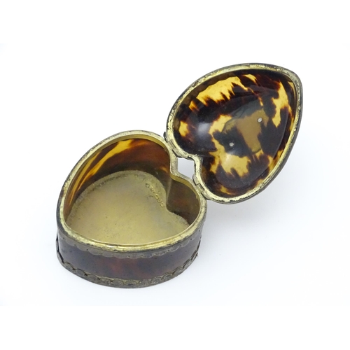 669 - A Victorian silver mounted tortoiseshell ring box of heart form, hallmarked Birmingham 1891, maker L... 