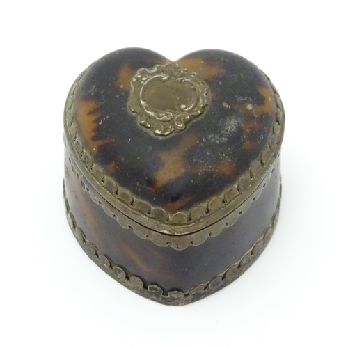 669 - A Victorian silver mounted tortoiseshell ring box of heart form, hallmarked Birmingham 1891, maker L... 