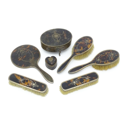 669 - A Victorian silver mounted tortoiseshell ring box of heart form, hallmarked Birmingham 1891, maker L... 