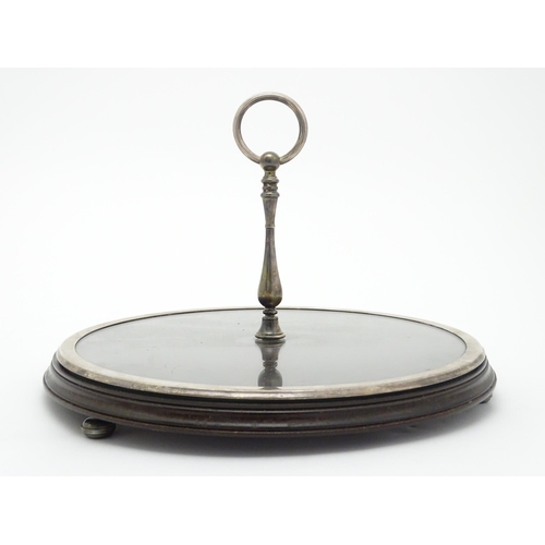 673 - A French Christofle stand with turned wooden base glass top and silver plate mounts, stamped Christo... 