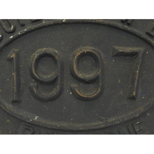 1085 - British Waterways Board Interest: A 20thC cast iron plaque of oval form titled 'Built BWB 1997 Bulbo... 