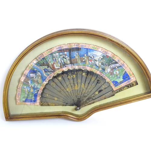 1099 - An early 20thC Chinese fan with hand painted paper scene depicting figures with offerings, the 20 la... 