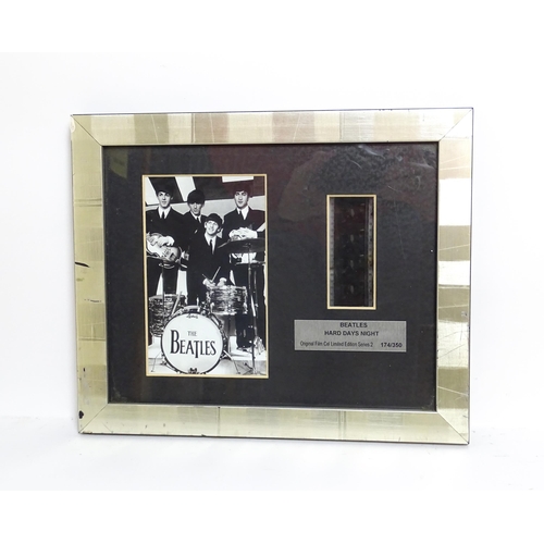 2128 - Pop music memorabilia : The Beatles , a c2003 framed 35mm film cell from the 1964 film 'A Hard Day's... 