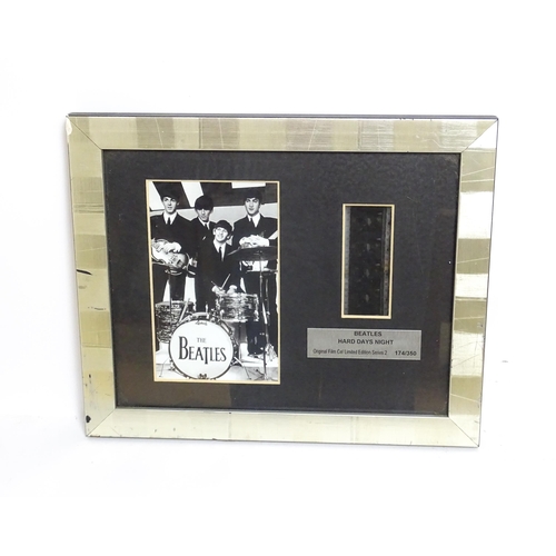 2128 - Pop music memorabilia : The Beatles , a c2003 framed 35mm film cell from the 1964 film 'A Hard Day's... 