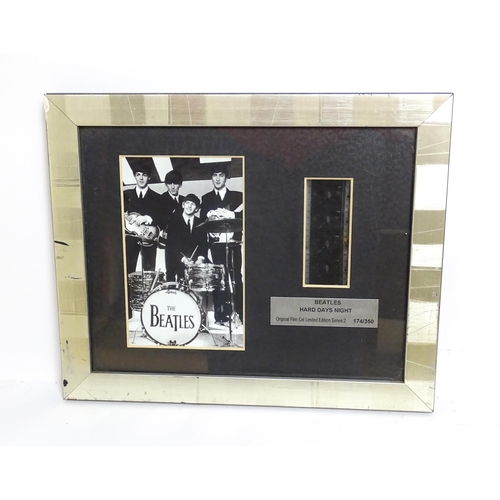 2128 - Pop music memorabilia : The Beatles , a c2003 framed 35mm film cell from the 1964 film 'A Hard Day's... 