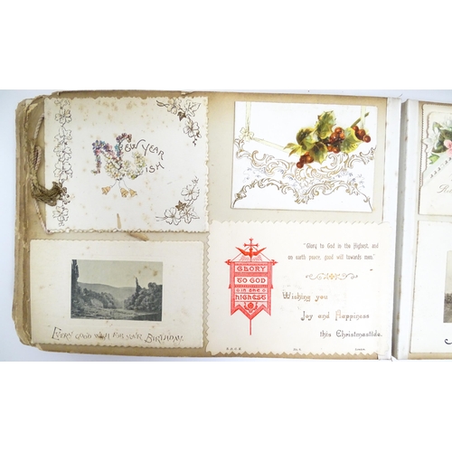 2138 - Three scrap albums, comprising a Victorian scrap album containing various greeting card samples; An ... 