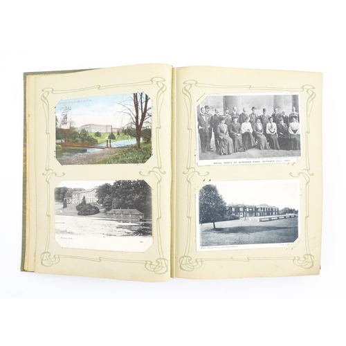 2139 - A 20thC postcard album to include various Royal residences, country houses and palaces to include Wi... 