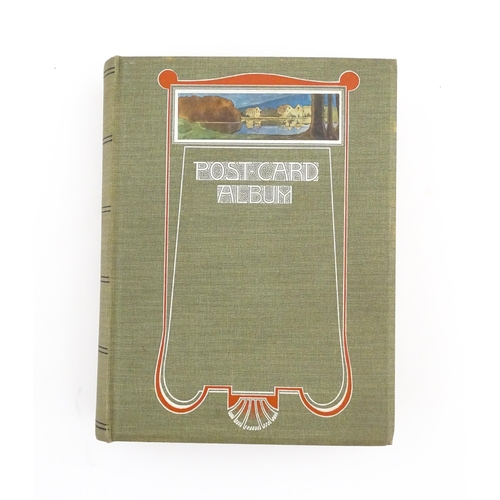 2139 - A 20thC postcard album to include various Royal residences, country houses and palaces to include Wi... 