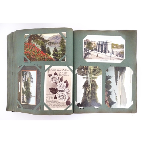 2142 - A 20thC postcard albums to include various topographical picture postcards to include Kenilworth, Ke... 