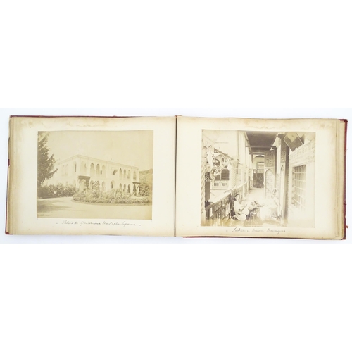 2146 - A Victorian photograph album containing various views to include Lincoln Cathedral, Dairy Bridge Rok... 