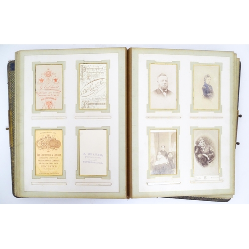 2148 - Four Victorian carte de visite photograph albums containing various portrait cards and photographs, ... 