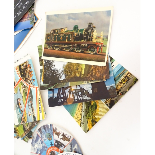 2150 - A large quantity of 20thC picture postcards to include church interiors, trains / locomotives, birds... 