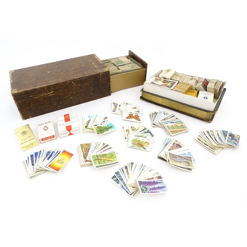 2155 - A large quantity of assorted 20thC cigarette and tea cards to include examples from Will's Cigarette... 