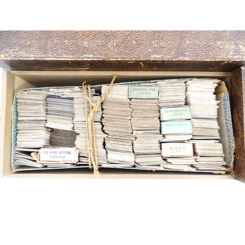 2155 - A large quantity of assorted 20thC cigarette and tea cards to include examples from Will's Cigarette... 