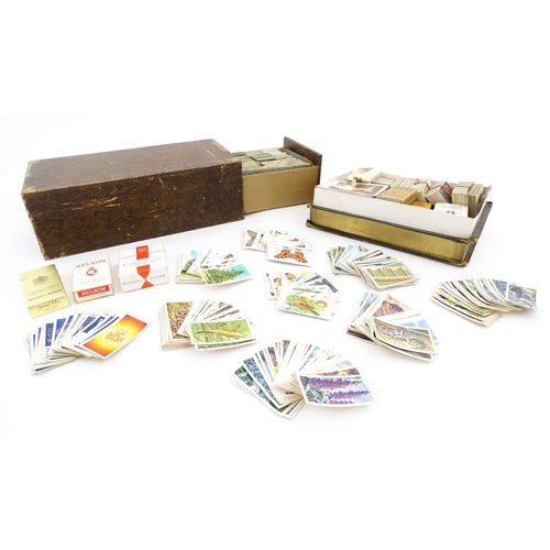 2155 - A large quantity of assorted 20thC cigarette and tea cards to include examples from Will's Cigarette... 