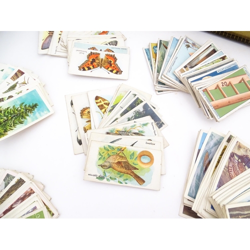 2155 - A large quantity of assorted 20thC cigarette and tea cards to include examples from Will's Cigarette... 