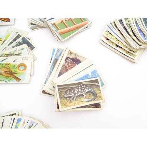 2155 - A large quantity of assorted 20thC cigarette and tea cards to include examples from Will's Cigarette... 