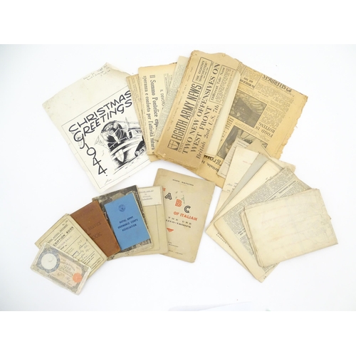 2159 - A quantity of World War II / Two military ephemera to include assorted 1940s newspapers pages to inc... 