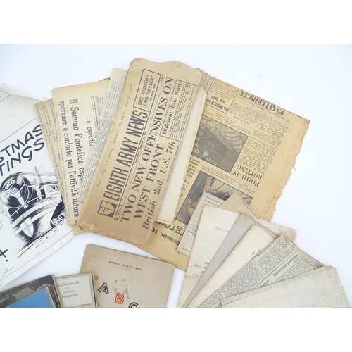 2159 - A quantity of World War II / Two military ephemera to include assorted 1940s newspapers pages to inc... 