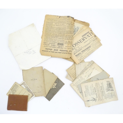 2159 - A quantity of World War II / Two military ephemera to include assorted 1940s newspapers pages to inc... 