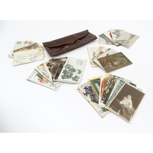 2161 - A quantity of assorted early 20thC postcards to include humorous examples, greetings cards, topograp... 