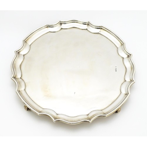 454 - A silver salver hallmarked Sheffield 1932, maker James Deakin & Sons. Approx. 12