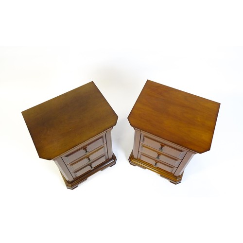 1584 - A pair of modern bedside cabinets with moulded tops, each chest having a cushion drawer above three ... 