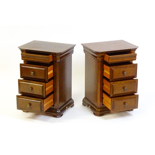 1584 - A pair of modern bedside cabinets with moulded tops, each chest having a cushion drawer above three ... 