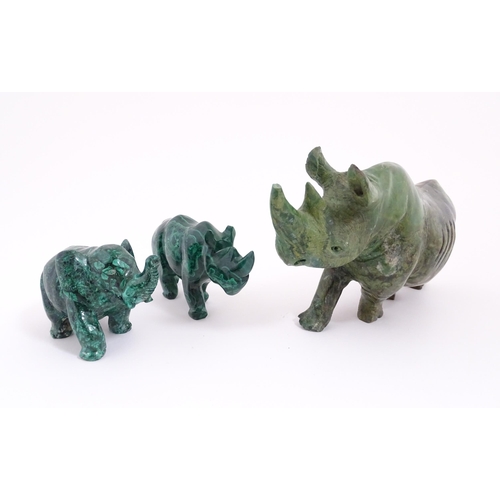 1122 - Ethnographic / Native / Tribal : Two 20thC carved malachite style animals comprising a rhino and an ... 