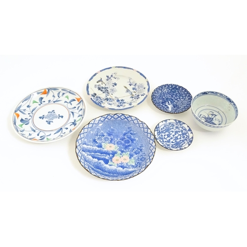 55A - Six assorted Japanese items to include plates decorated with flowers and birds, dishes with scrolled... 