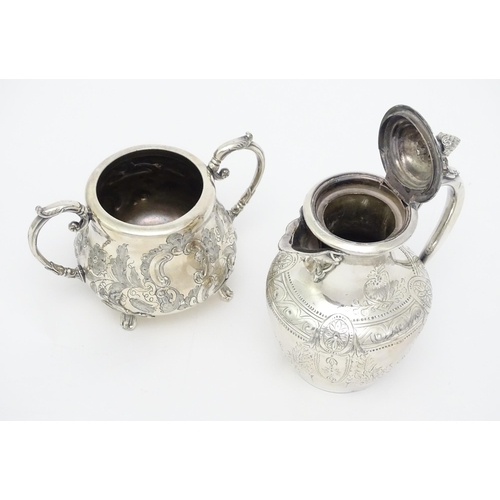 672 - A quantity of assorted silver plate items comprising an exceptionally large twin handled tray, a tea... 