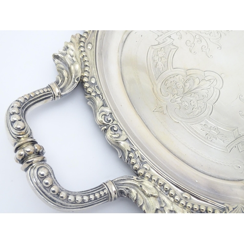 672 - A quantity of assorted silver plate items comprising an exceptionally large twin handled tray, a tea... 