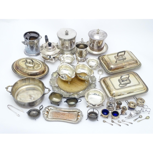 682 - A quantity of assorted silver plated wares to include sauce boats, serving dishes, cruets, teapot, s... 