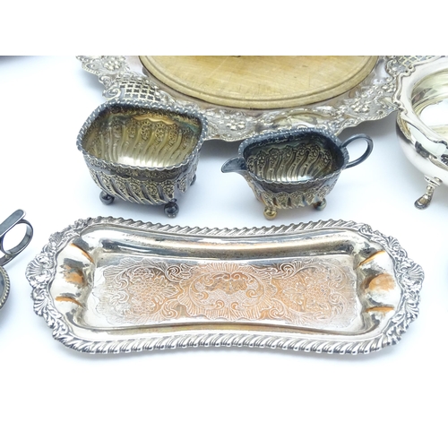 682 - A quantity of assorted silver plated wares to include sauce boats, serving dishes, cruets, teapot, s... 