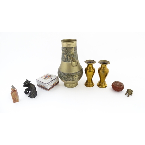 1089 - A quantity of assorted Oriental items to include a pair of cast brass vases of tapering form with lo... 