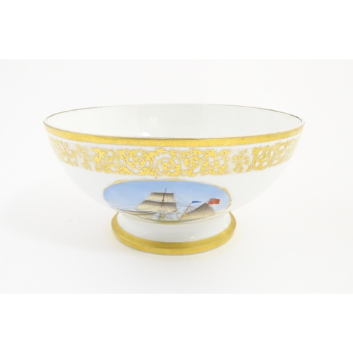 115A - An English pedestal bowl with hand painted sailing ship vignette and gilt scrolling foliate border. ... 