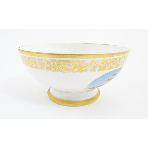 115A - An English pedestal bowl with hand painted sailing ship vignette and gilt scrolling foliate border. ... 