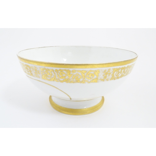 115A - An English pedestal bowl with hand painted sailing ship vignette and gilt scrolling foliate border. ... 