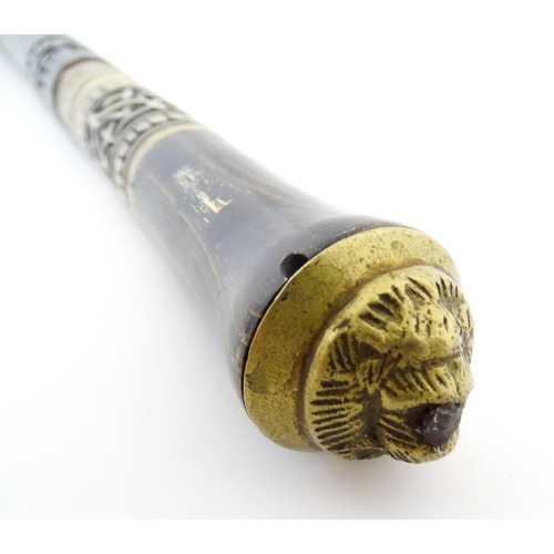 1249 - An early 20thC Indian sword stick with horn handle with brass lion mask pommel, the ebonised shaft w... 