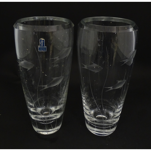 204 - A pair of Whitefriars glass vases each with engraved fish and reed decoration designed by Geoffrey B... 