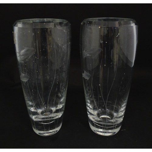 204 - A pair of Whitefriars glass vases each with engraved fish and reed decoration designed by Geoffrey B... 