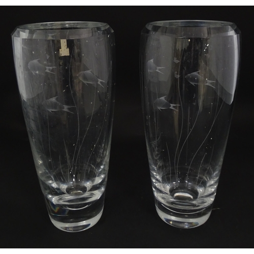 204 - A pair of Whitefriars glass vases each with engraved fish and reed decoration designed by Geoffrey B... 