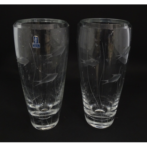 204 - A pair of Whitefriars glass vases each with engraved fish and reed decoration designed by Geoffrey B... 